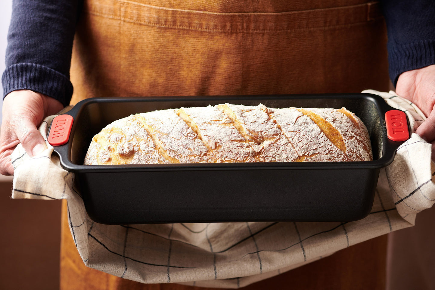 Fresh sourdough loaf baked in a Woll Let's Bake! loaf pan